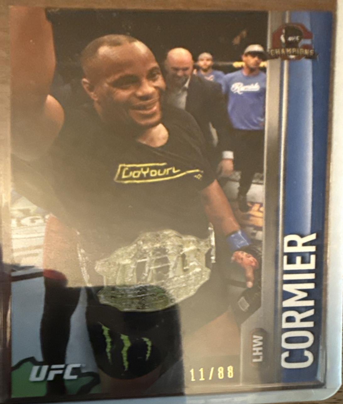 2015 Topps UFC Champions #74 — Daniel Cormier — Blue parallel, front