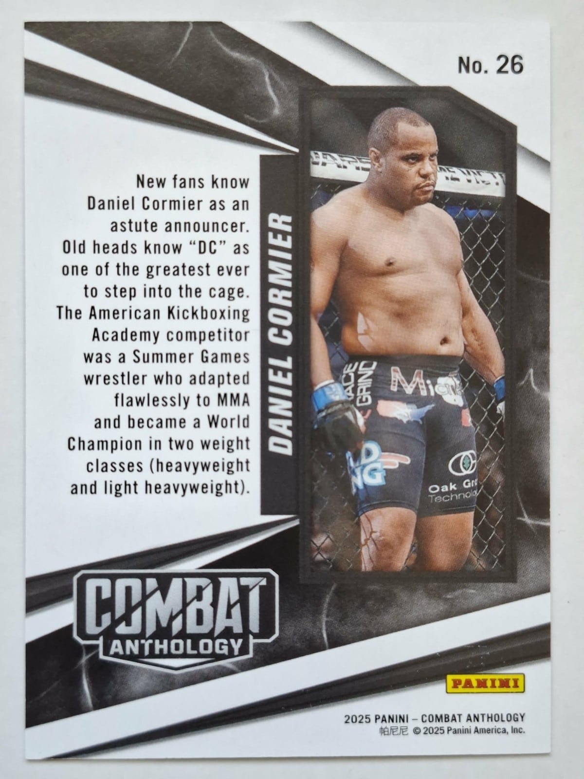 2025 Panini Combat Anthology #26 — Daniel Cormier — Purple parallel, back