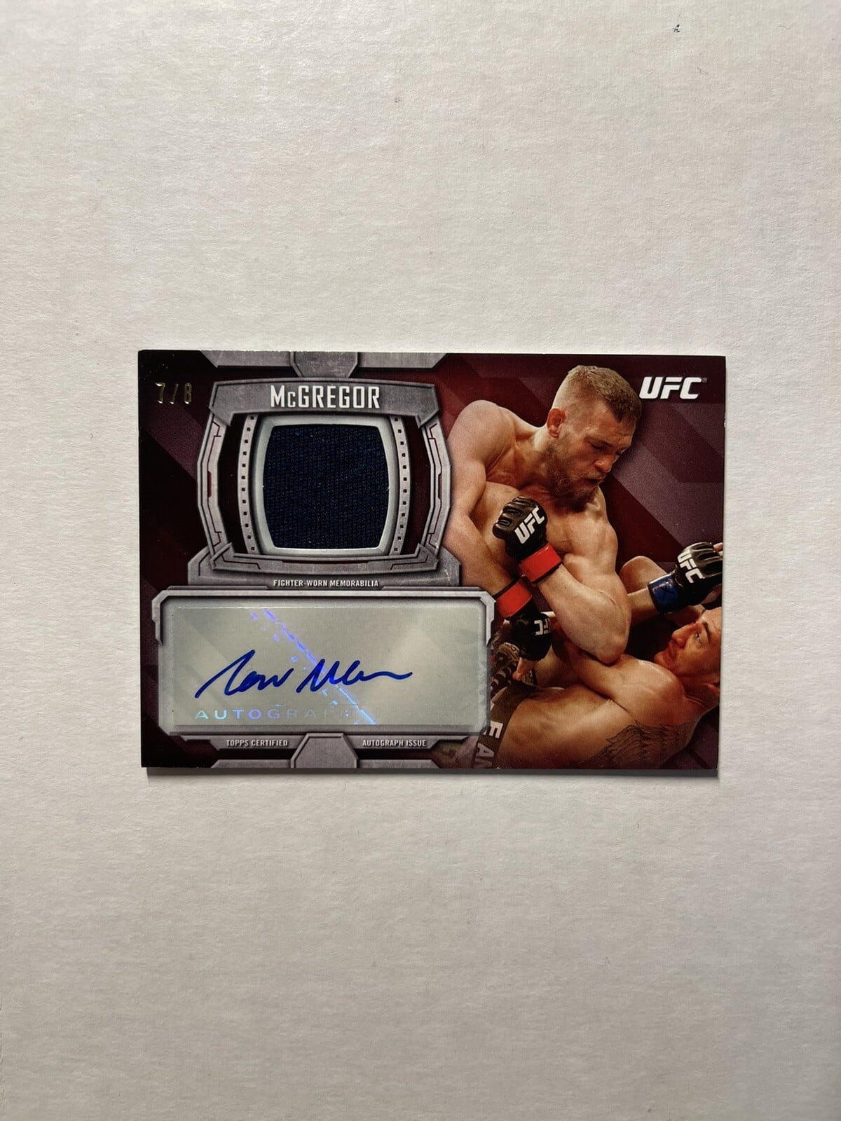 2014 Topps UFC Knockout #KAR-CM — Conor McGregor — Ruby parallel, front