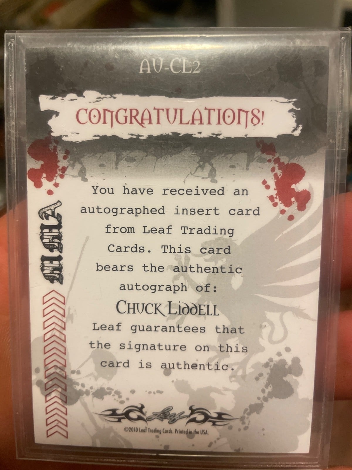 2010 Leaf MMA #AU-CL2 — Chuck Liddell — Red parallel, back
